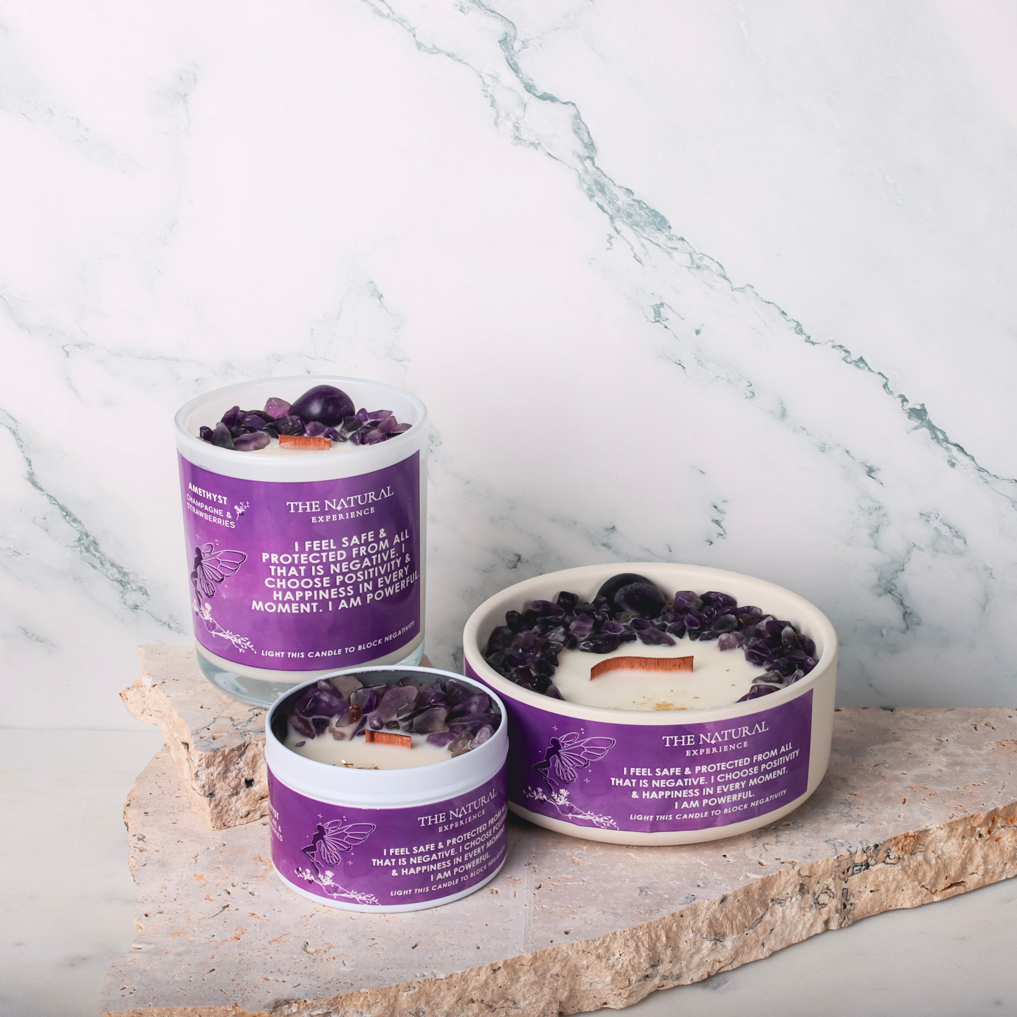 Amethyst Crystal Candle emitting a warm glow, surrounded by calming decor, highlighting its protective and uplifting properties.